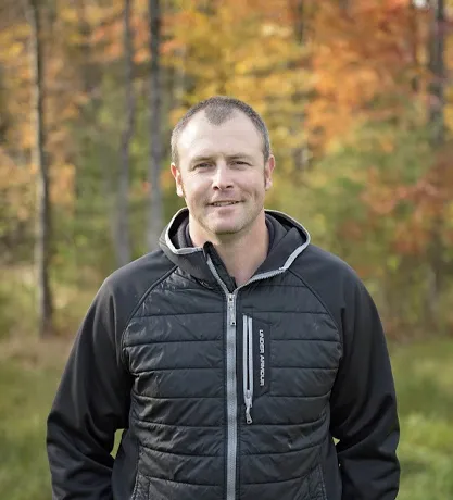 headshot of Chad in the woods